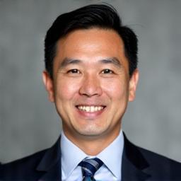 Professional headshot of Marcus Tan